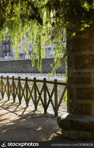 Wooden fence at the riverside, Sarthe River, Pont Yssoir, Le Mans, Sarthe, France
