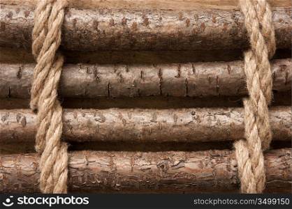wooden fence with a rope tied