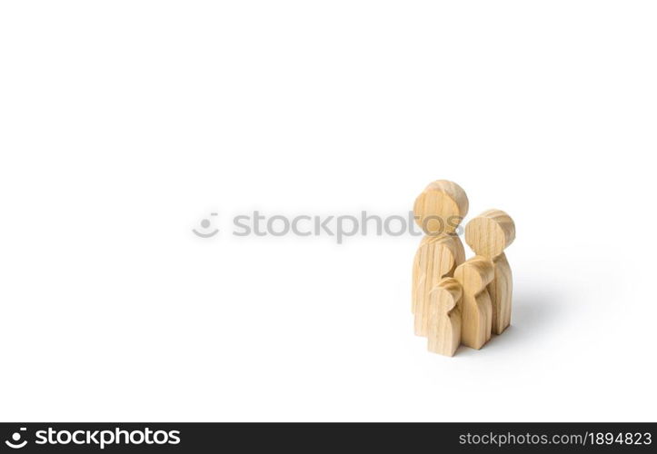 Wooden figurines of the family on a white background. Family values and health. Adoption and custody of children. Social support, demography, sociology. Upbringing and education. Together concept