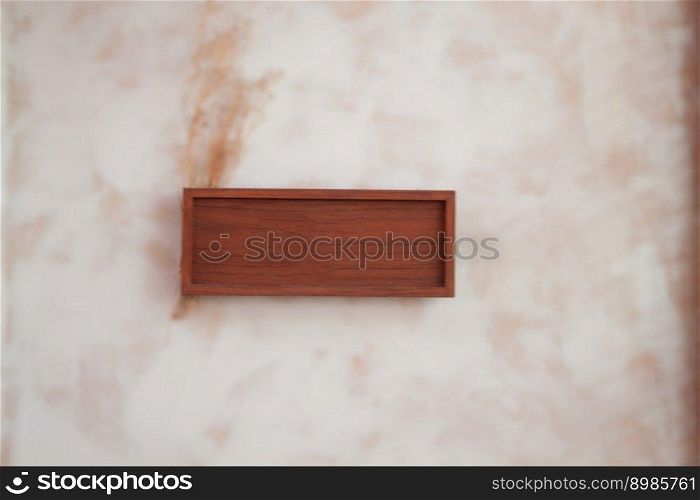 Wooden frame decorated on wall, stock photo