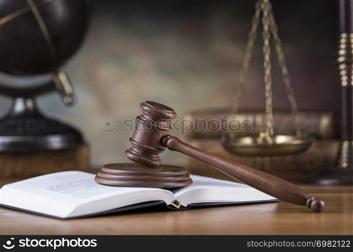 Wooden gavel and books, Law, globe concept