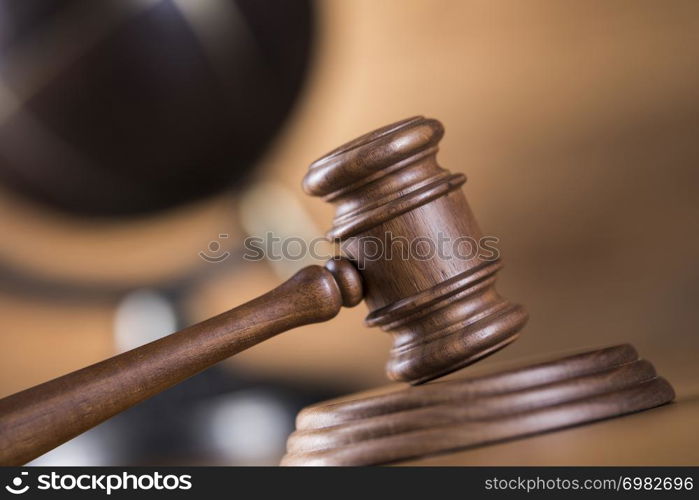 Wooden gavel and books, Law, globe concept