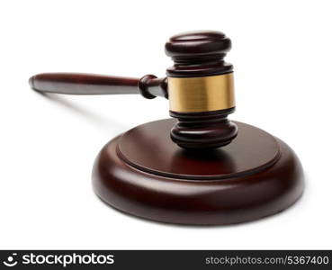 Wooden gavel and sound block isolated on white