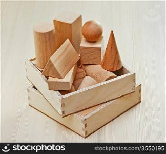 wooden geometric shapes on the table