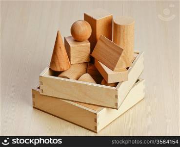 wooden geometric shapes on the table