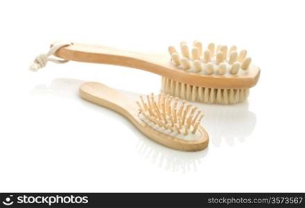 wooden hairbrush and brush