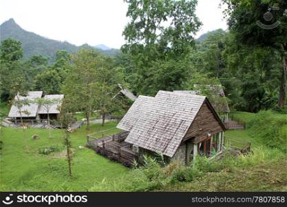 Wooden hauses in the deep forest in Northern Thailand