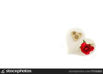 Wooden heart and red rose isolated on white design for Valentines Day