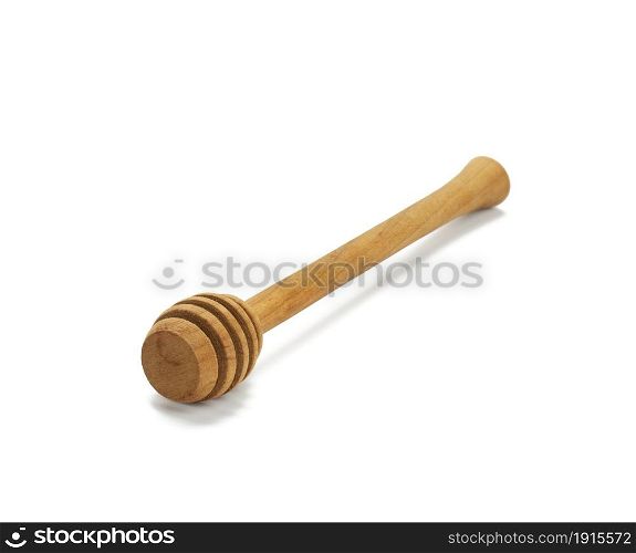 wooden honey stick on white isolated background