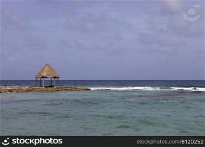 wooden house at the caribbean sea, yucatan, mexico