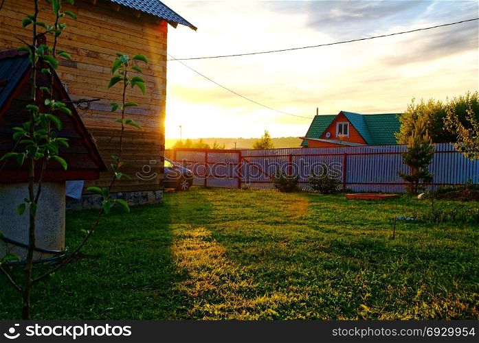 wooden house for a rural plot in the spring. wooden house for a rural plot in the spring, Russia