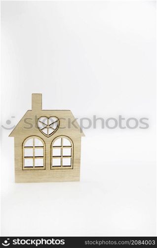 Wooden house icon isolated on white background with copy space, real estate, new home and mortgage concept space for text. Wooden house icon isolated on white background with copy space, real estate, new home and mortgage concept