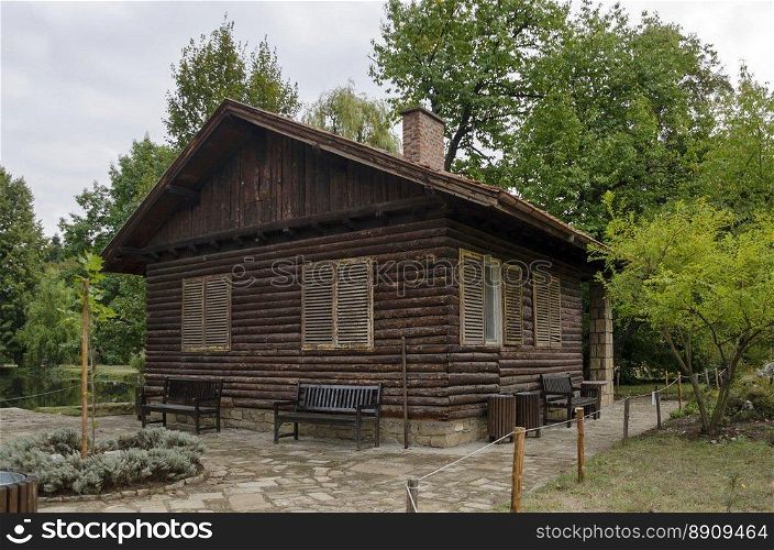 Wooden house  in National monument of landscape architecture Park museum Vrana in former time royal palace on the outskirts of Sofia, Bulgaria, Europe