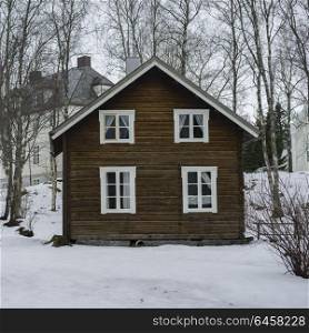 Wooden house in snow, Norway