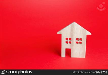 Wooden house on red background. Buying and selling real estate. Housing, realtor services. Renovation and home improvement. Building maintenance. Short and long term rentals. Mortgage loan.