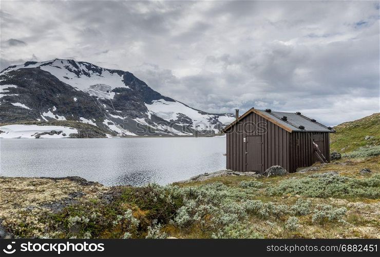 wooden house or hut at the famous County Road 55. Highest mountain road in Norway, part of National Tourist Route