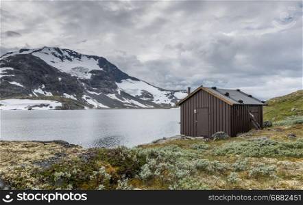 wooden house or hut at the famous County Road 55. Highest mountain road in Norway, part of National Tourist Route