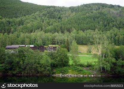 Wooden houses and river in Norway