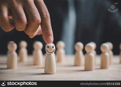 Wooden human figure touched by man hand. HR officer looks for leader and CEO. Leader breaks from crowd. Personal development, motivation, challenge. HR, HRM, HRD concepts. Human Resource Management.