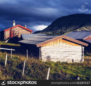 wooden huts in Norway mountains