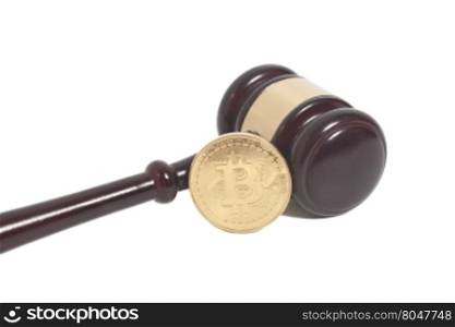 Wooden judge gavel with Golden Bitcoin coin (digital virtual money) isolated on white