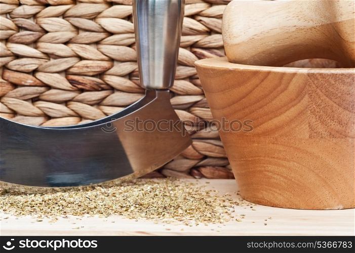 Wooden kitchen utensils and herb chopper