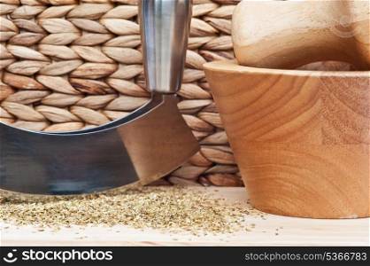Wooden kitchen utensils and herb chopper