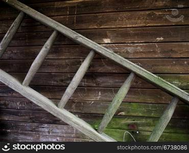 Wooden ladder. old wooden ladder before a cabin