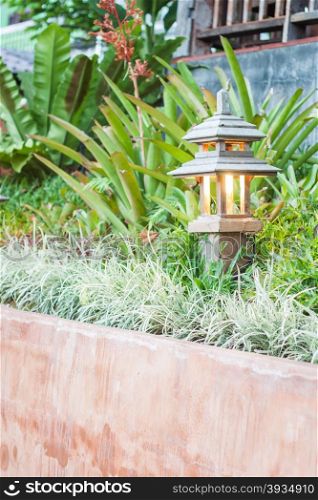Wooden lamp decorated in garden, stock photo