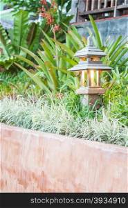Wooden lamp decorated in garden, stock photo