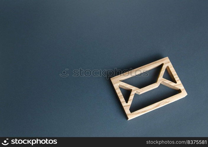 Wooden letter envelope. Contact concept. Postal correspondence. Mail notification. Communication internet technologies. Email. Business representations on the Internet and social media. Feedback