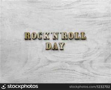 Wooden letters of the alphabet in the form of the words ROCK &rsquo;N&rsquo; ROLL DAY lying on the table. Beautiful card. Isolated background, wooden surface. Congratulations for relatives, friends and colleagues. Happy ROCK &rsquo;N&rsquo; ROLL DAY. Beautiful card.