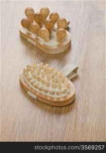 wooden massagers on wooden background