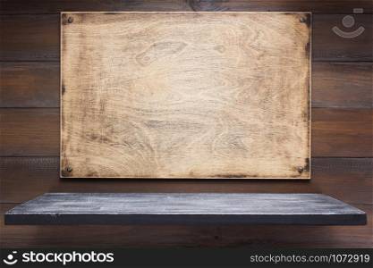 wooden nameplate or sign board and shelf at wall background