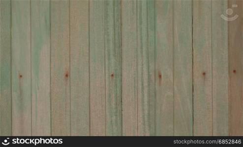 Wooden old fence, green background. Background picture made of old green wood boards