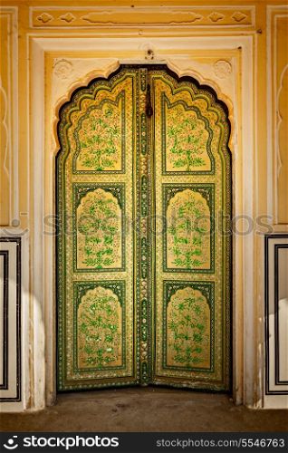 Wooden old ornamented door vintage texture background