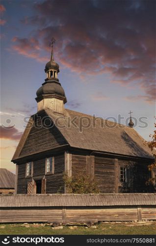 wooden Orthodox church in the fall. Belarus.