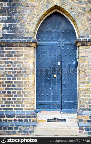 wooden parliament in london old church door and marble antique wall