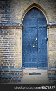 wooden parliament in london old church door and marble antique wall