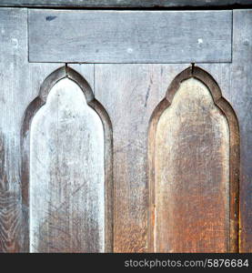 wooden parliament in london old door and marble antique wall