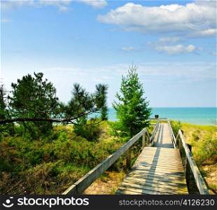 Wooden path over dunes at beach. Pinery provincial park, Ontario Canada