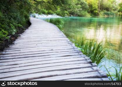 Wooden path over lake. Plitvice Lake Nationak Park, Croatia