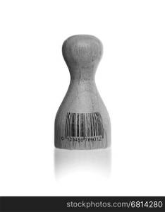 Wooden pawn with a barcode, isolated on whit