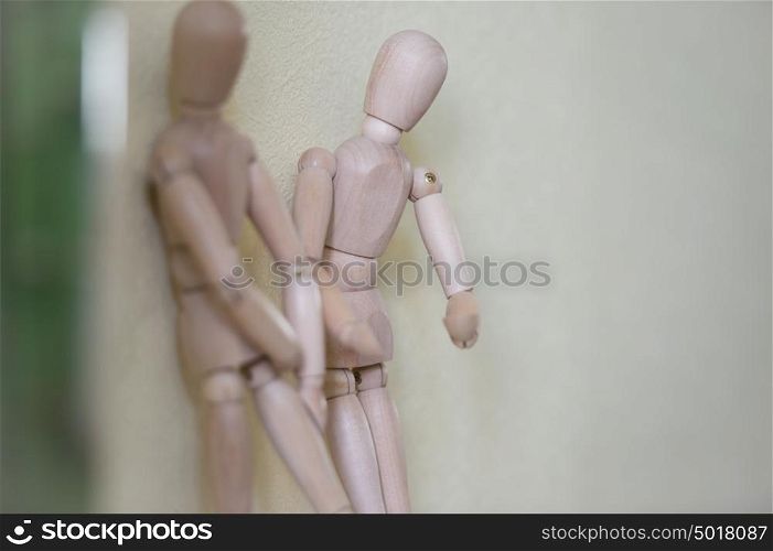 Wooden people standing at home and chatting. People relationship concept