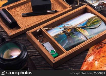 Wooden photo box with photo from travel. Decorated with different things. Travel concept.. Wooden photo box with photo from travel