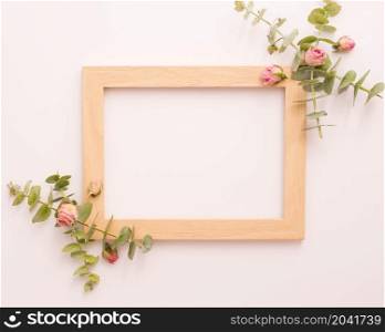 wooden picture frame decorated with pink roses eucalyptus