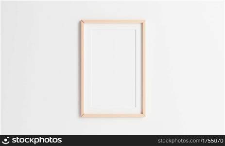 Wooden picture frame hanging on white wall background. 2:3 ratio photo frame size. 3D illustration rednering graphic interior design