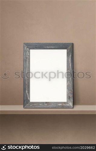 Wooden picture frame leaning on a brown shelf. 3d illustration. Blank mockup template. Vertical background. Wooden picture frame leaning on a brown shelf. 3d illustration. Vertical background