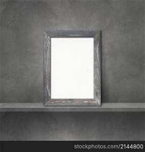 Wooden picture frame leaning on a grey shelf. 3d illustration. Blank mockup template. Square background. Wooden picture frame leaning on a grey shelf. 3d illustration. Square background