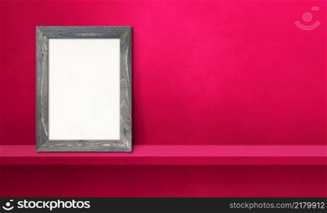 Wooden picture frame leaning on a pink shelf. 3d illustration. Blank mockup template. Horizontal banner. Wooden picture frame leaning on a pink shelf. 3d illustration. Horizontal banner